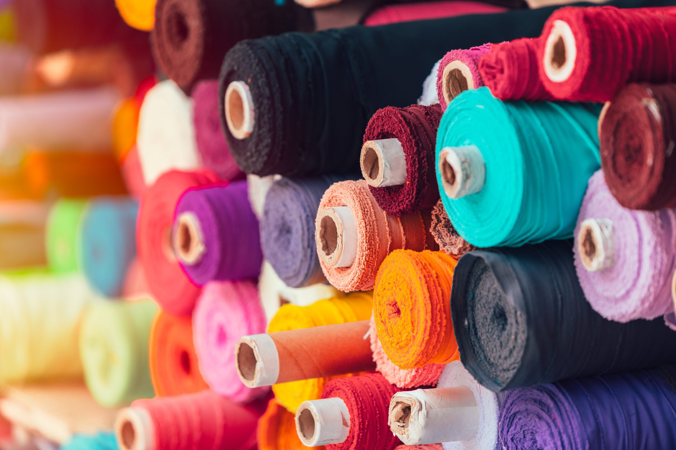 colorsful fabric silk rolls in textile shop industry from india